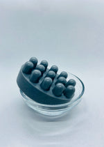 Load image into Gallery viewer, Our Activated Charcoal Massage Bar contains ingredients that are known to aid in relief of aching muscles and tension, promote soft skin and anti-aging, have antimicrobial properties, assist in detoxification and anti-inflammation of the skin and wash away dirt. Activated charcoal is made from coconut shells, washed for purity, and pH neutral.
